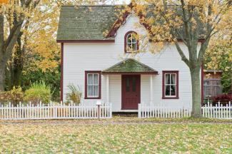 white house under maple trees by Scott Webb courtesy of Unsplash.