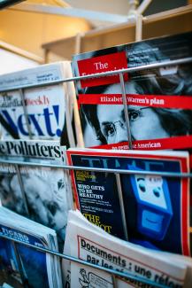 magazines displayed on a rack by Markus Spiske courtesy of Unsplash.