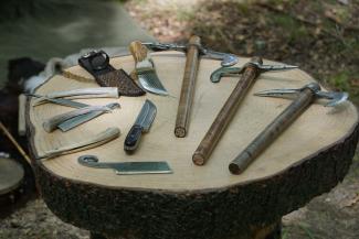 assorted axe and knives by Chris Chow courtesy of Unsplash.